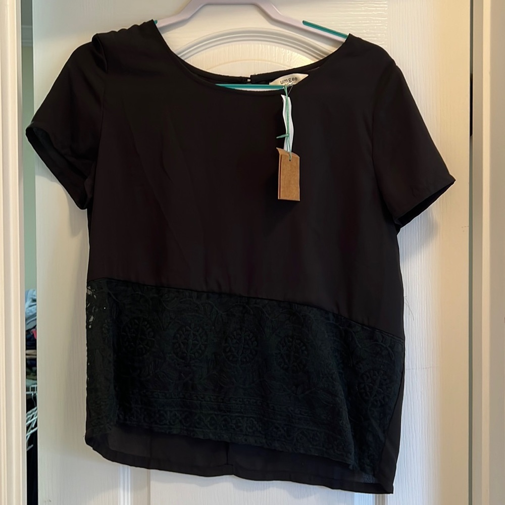 Black top with beautiful lace detailing shown above